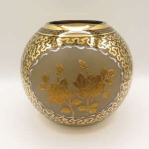 glass ball shaped vase decorated with gold design