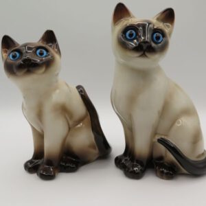 two ceramic cat figurines