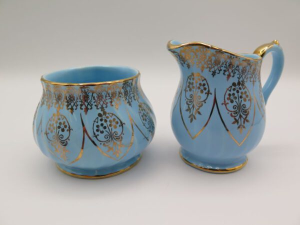 blue and gold cream and sugar set