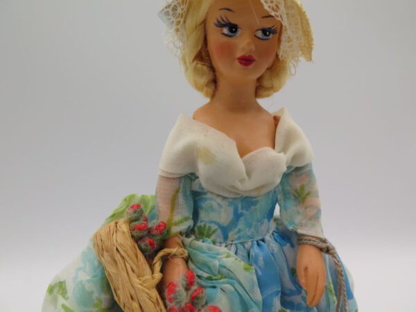 doll with flowers
