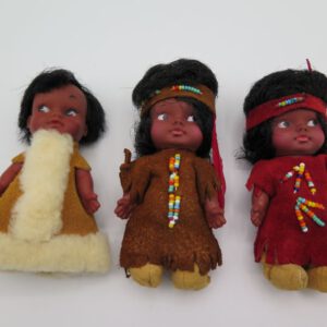 three indigenous dolls