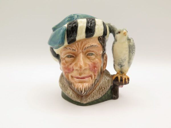 ceramic creamer man's head with falcon for a handle