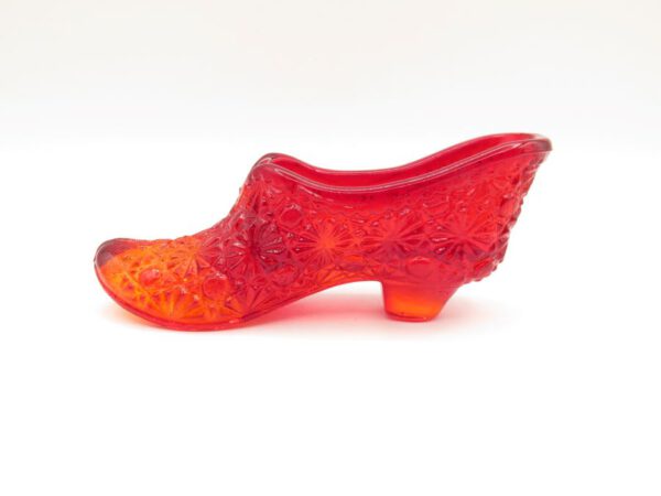 small red glass shoe for trinkets