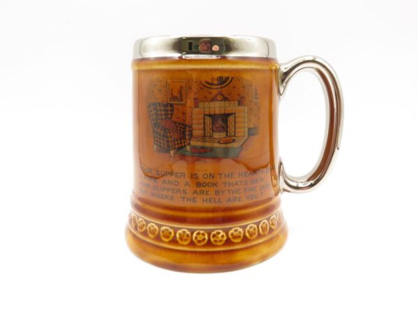 brown ceramic mug