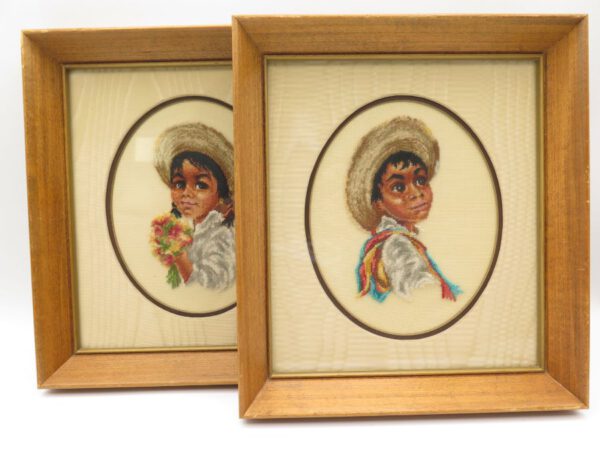 two framed pictures done in petit point