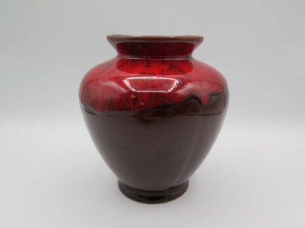 brown and red clay vase
