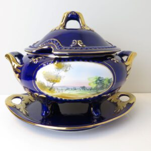 a tureen with a lid on a tray