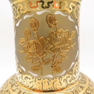 brown glass vase decorated in gold